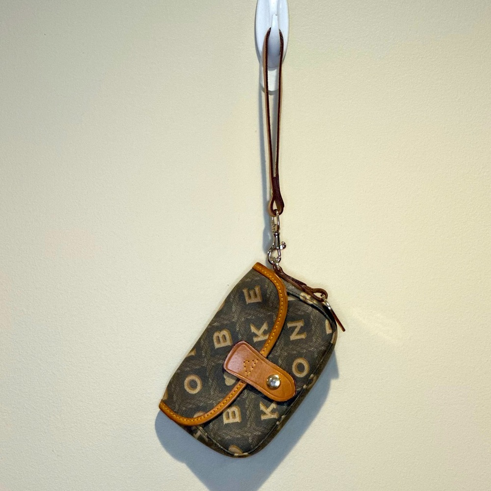 Vintage Dooney and Burke Wristlet. Brown, black and tan.